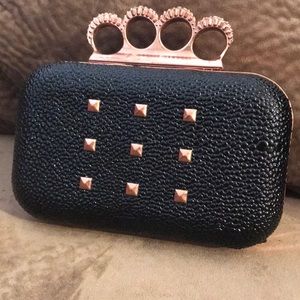 Rose gold Knuckle clutch
